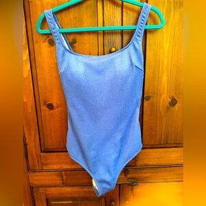 Gottex light blue vertical pattern, 1 piece bathing suit size 12. EUC